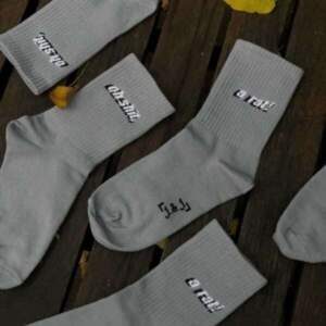 Socks from 1and1 with the inscription Oh sh*t ! A rat!